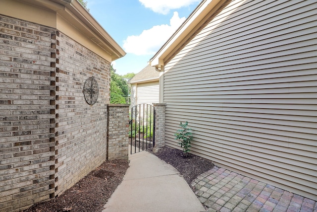 902 Heathrow Ln, Naperville, IL 60540 - entrance to property featuring a gate and brick siding