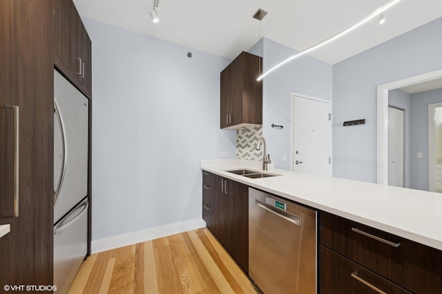 8 E Randolph St Unit 3203, Chicago, IL 60601 - kitchen with appliances with stainless steel finishes, modern cabinets, light countertops, and light wood-style floors