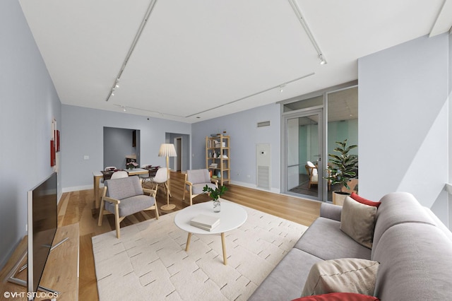 8 E Randolph St Unit 3203, Chicago, IL 60601 - living room with track lighting and light wood finished floors