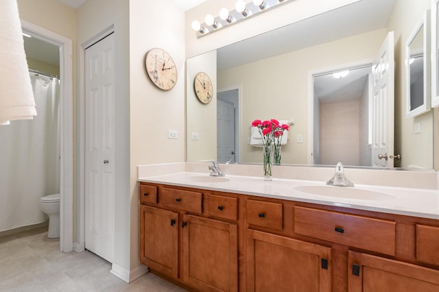 21402 Carlton St, Crest Hill, IL 60403 - bathroom with double vanity and toilet