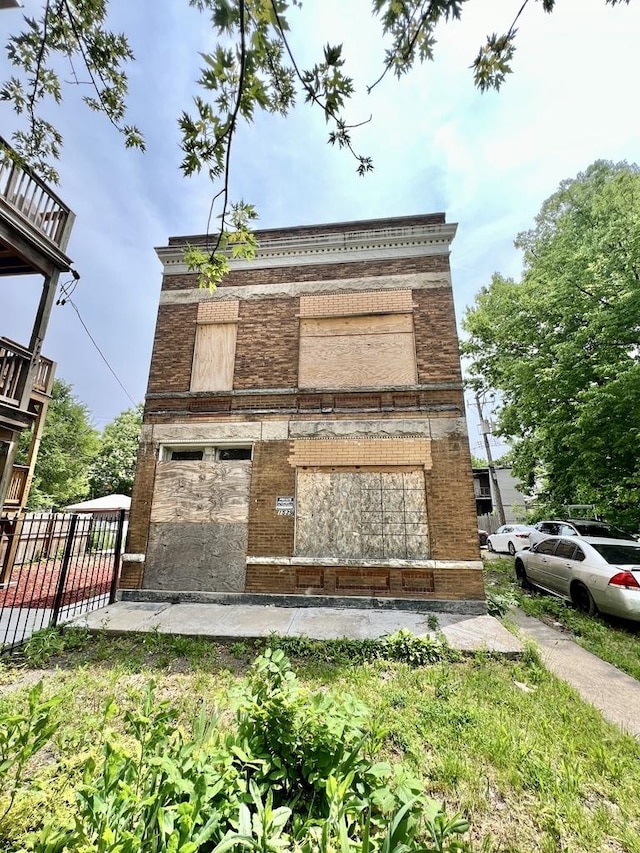 1539 S Harding Ave, Chicago, IL 60623 - view of side of property with brick siding