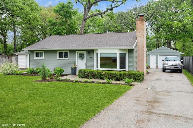 2365 N Barrington Woods Rd, Palatine, IL 60074 - ranch-style house with a garage, an outdoor structure, a chimney, and roof with shingles