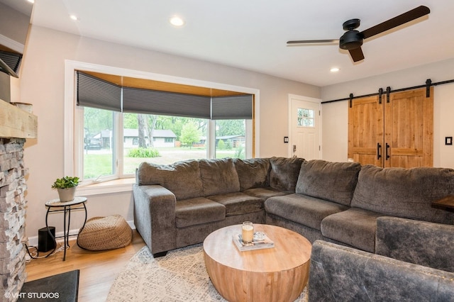 2365 N Barrington Woods Rd, Palatine, IL 60074 - living area featuring a barn door, plenty of natural light, ceiling fan, wood finished floors, and recessed lighting
