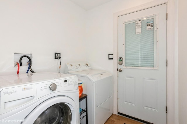 2365 N Barrington Woods Rd, Palatine, IL 60074 - laundry room with separate washer and dryer and wood finished floors