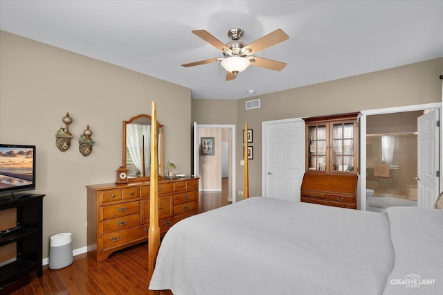 1568 Sedona Ave, Aurora, IL 60504 - bedroom with dark wood-type flooring, connected bathroom, and ceiling fan