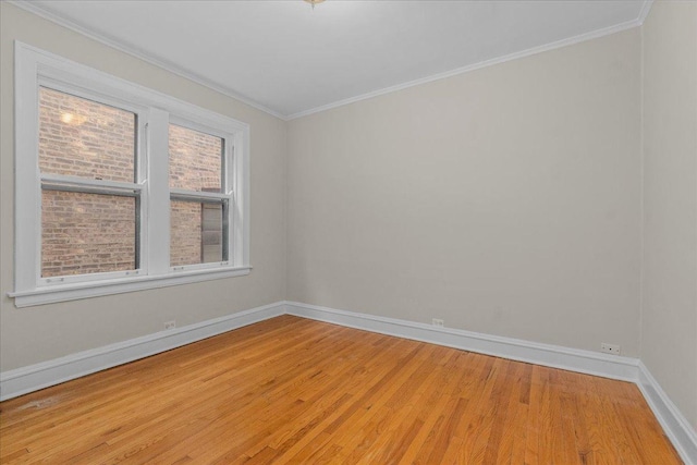 819 Forest Ave Unit 2W, Evanston, IL 60202 - empty room featuring light wood-style floors and crown molding
