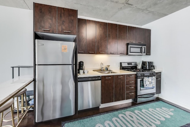 659 W Randolph St Unit 1115, Chicago, IL 60661 - kitchen with appliances with stainless steel finishes, dark brown cabinets, and light countertops
