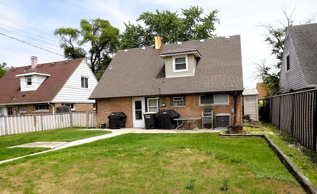 17008 Oakwood Ave, Lansing, IL 60438 - rear view of property featuring brick siding, a patio, a fenced backyard, roof with shingles, and a chimney