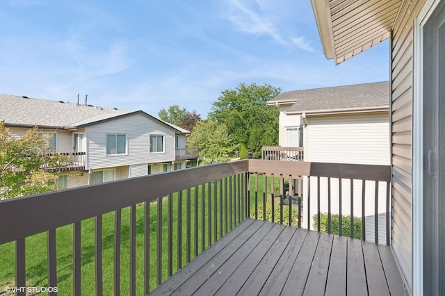 1351 Kingsbury Dr Unit 5, Hanover Park, IL 60133 - wooden terrace with a lawn