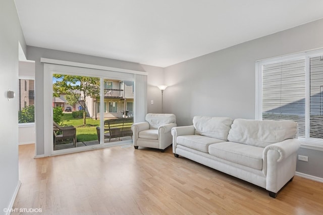 1351 Kingsbury Dr Unit 5, Hanover Park, IL 60133 - living area with wood finished floors and baseboards
