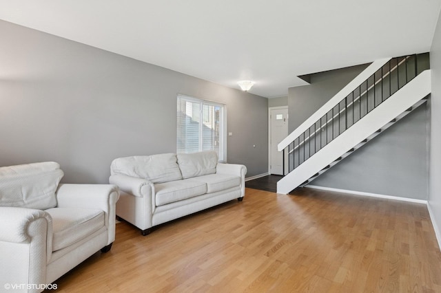 1351 Kingsbury Dr Unit 5, Hanover Park, IL 60133 - living area featuring wood finished floors and stairs