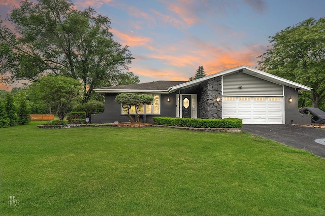 12620 S Kinvarra Dr, Palos Park, IL 60464 - view of front of property featuring a garage, asphalt driveway, a yard, and brick siding