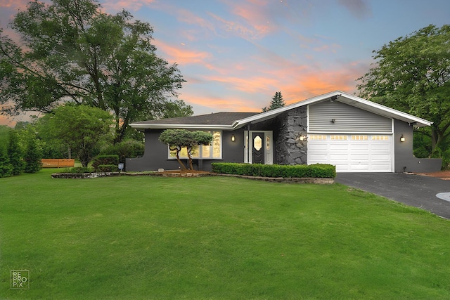 12620 S Kinvarra Dr, Palos Park, IL 60464 - view of front of home featuring driveway, a garage, a front yard, and stone siding