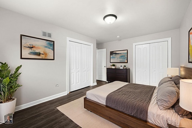 12620 S Kinvarra Dr, Palos Park, IL 60464 - bedroom featuring multiple closets and dark wood finished floors