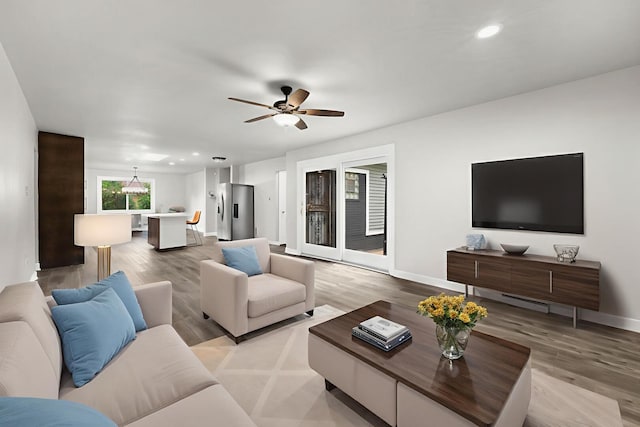 12620 S Kinvarra Dr, Palos Park, IL 60464 - living room with light wood-style floors, recessed lighting, and ceiling fan