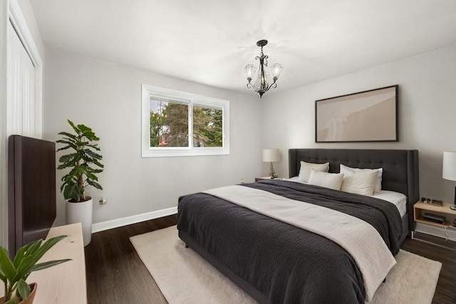 12620 S Kinvarra Dr, Palos Park, IL 60464 - bedroom featuring a chandelier, dark wood-style floors, and a closet