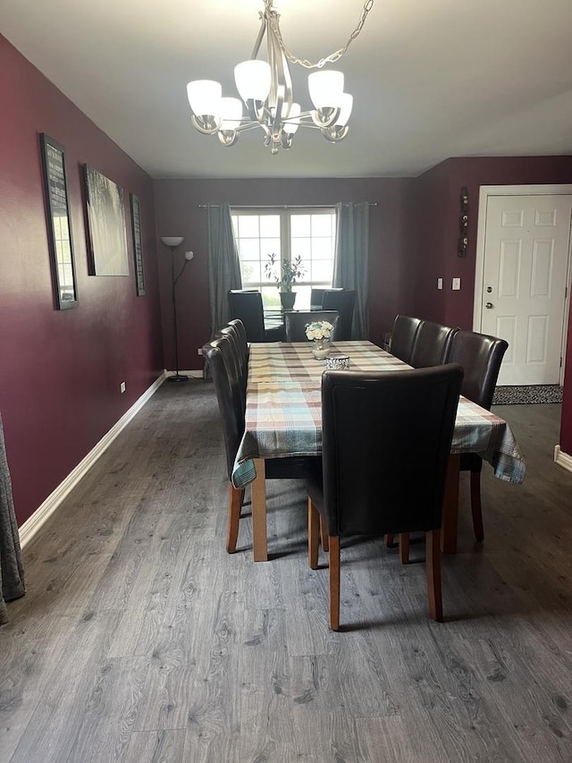 142 Sedgewicke Dr, Romeoville, IL 60446 - dining room featuring a chandelier and wood finished floors