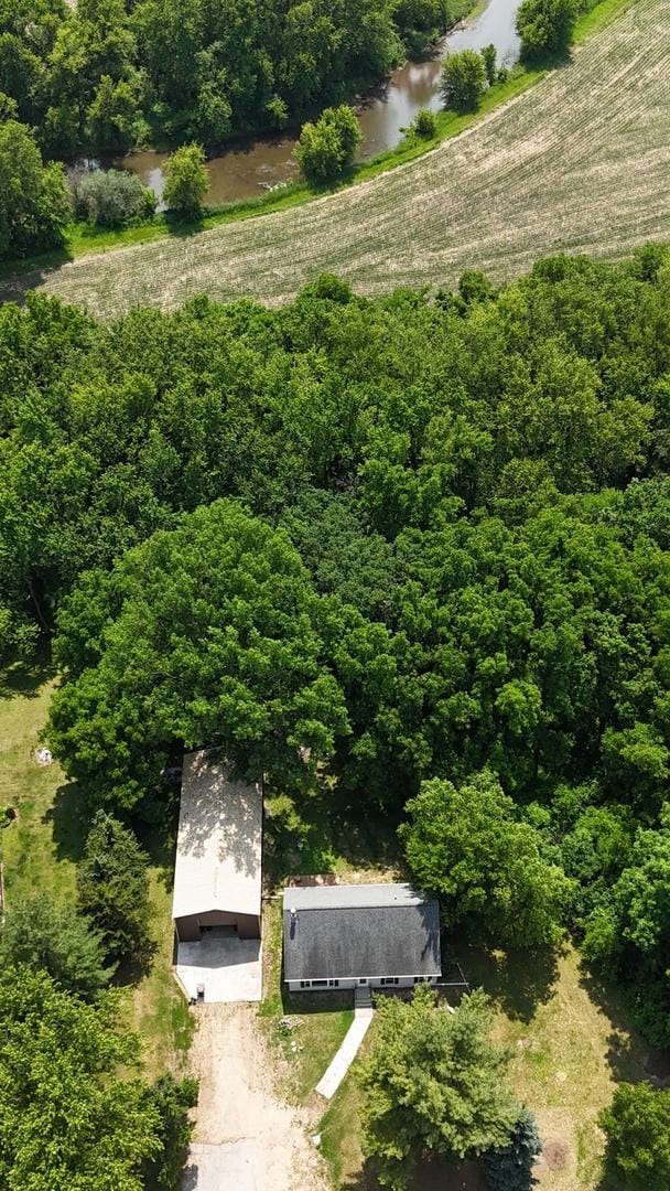 32597 Genoa Rd, Genoa, IL 60135 - bird's eye view of a nearby body of water and a heavily wooded area