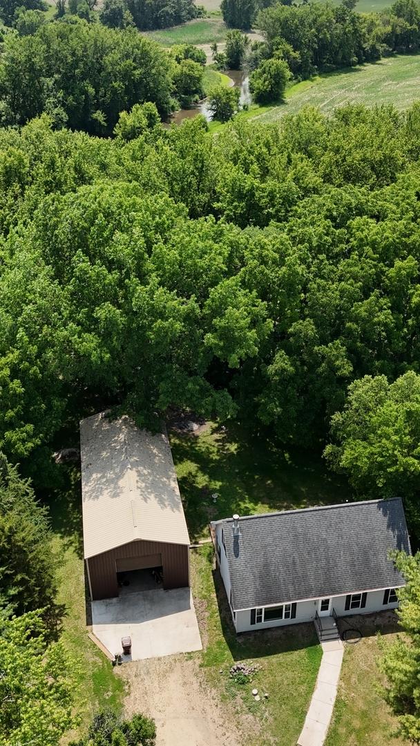 32597 Genoa Rd, Genoa, IL 60135 - view of subject property featuring a forest