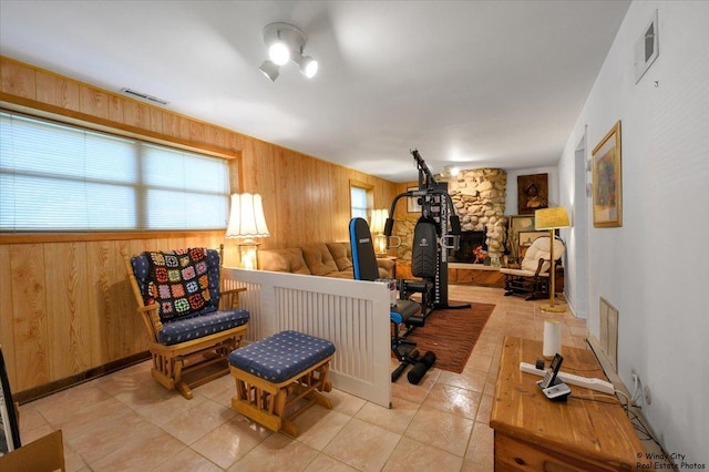 36 W Green Meadows Blvd, Streamwood, IL 60107 - sitting room with wood walls and light tile patterned flooring