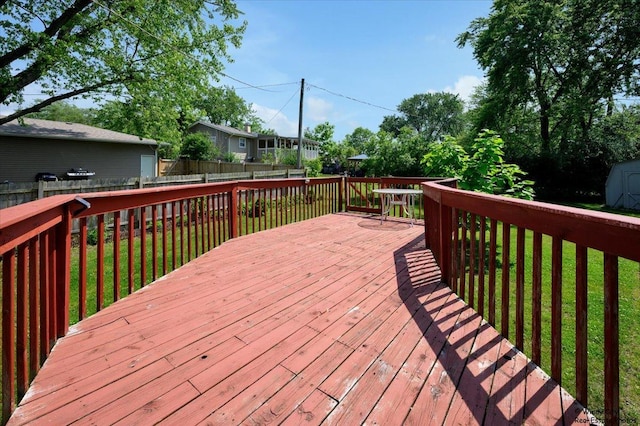 36 W Green Meadows Blvd, Streamwood, IL 60107 - wooden terrace featuring a shed and a fenced backyard
