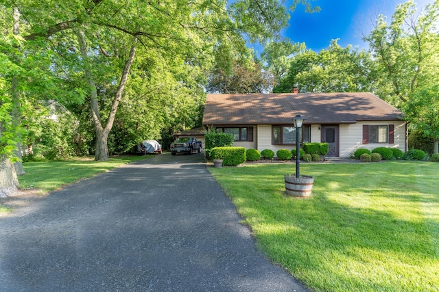 1333 W 59th St, La Grange Highlands, IL 60525 - ranch-style home with a chimney, asphalt driveway, a front lawn, and a shingled roof