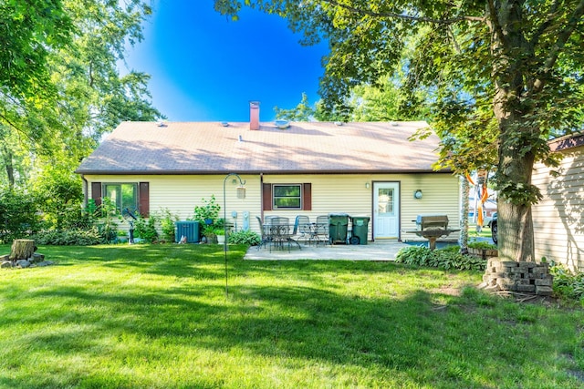 1333 W 59th St, La Grange Highlands, IL 60525 - back of property featuring a patio, a yard, and roof with shingles