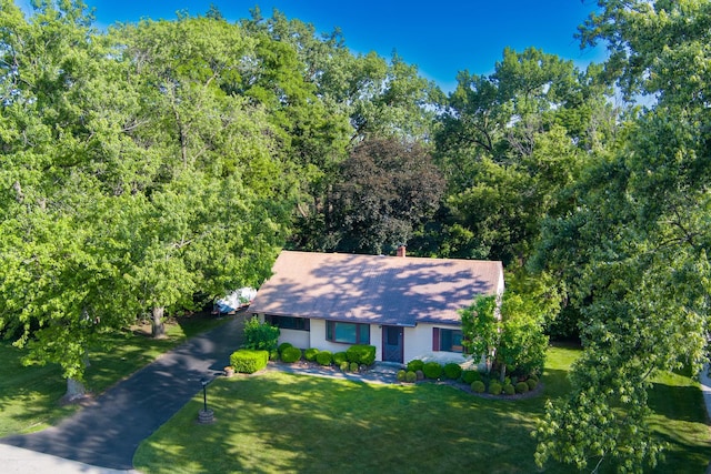 1333 W 59th St, La Grange Highlands, IL 60525 - view of front facade featuring a front lawn, a shingled roof, and a chimney