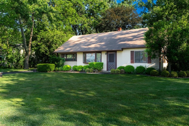 1333 W 59th St, La Grange Highlands, IL 60525 - view of front facade featuring a front lawn and a chimney