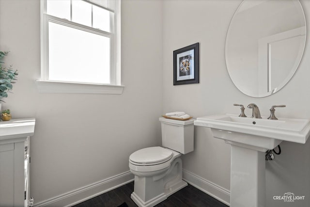 3578 Doral Dr, Elgin, IL 60124 - half bath with baseboards and wood finished floors