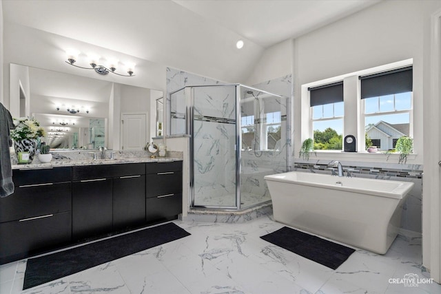 3578 Doral Dr, Elgin, IL 60124 - full bathroom featuring a marble finish shower, a freestanding bath, marble look tile flooring, vanity, and vaulted ceiling