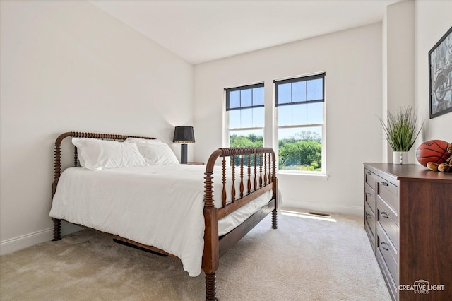 3578 Doral Dr, Elgin, IL 60124 - bedroom with baseboards and light colored carpet