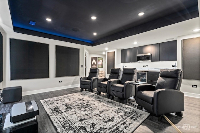 3578 Doral Dr, Elgin, IL 60124 - home theater featuring a tray ceiling, wood finished floors, and recessed lighting
