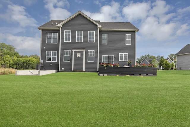 3578 Doral Dr, Elgin, IL 60124 - rear view of property featuring a lawn and a patio area
