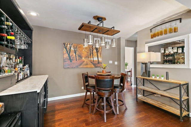 2165 Greystone Pl, Hoffman Estates, IL 60169 - dining space featuring dark wood-type flooring, a dry bar, and recessed lighting