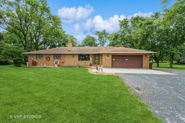 14119 W Maple Rd, Mokena, IL 60448 - ranch-style home with driveway, a chimney, a front yard, and an attached garage