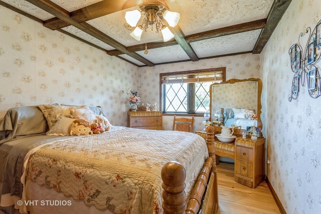 14119 W Maple Rd, Mokena, IL 60448 - bedroom featuring light wood-style flooring, beam ceiling, coffered ceiling, wallpapered walls, and ceiling fan