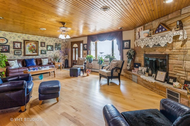 14119 W Maple Rd, Mokena, IL 60448 - living room with a stone fireplace, wooden ceiling, and wood finished floors