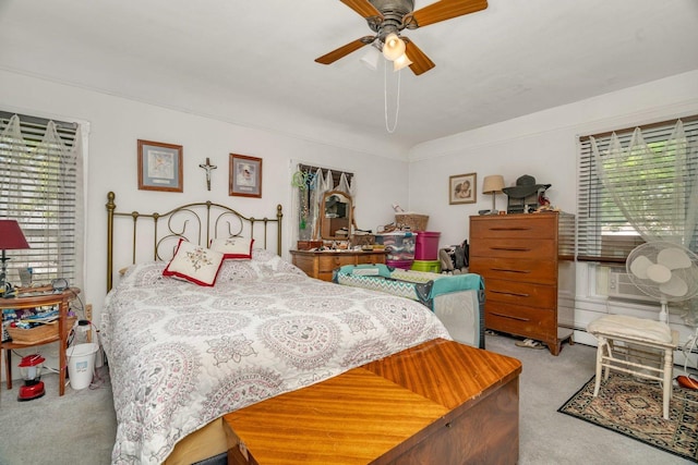 107 N Elm St, Gardner, IL 60424 - bedroom featuring carpet flooring, a baseboard heating unit, cooling unit, and ceiling fan