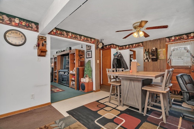 107 N Elm St, Gardner, IL 60424 - bar area featuring a ceiling fan and tile patterned floors