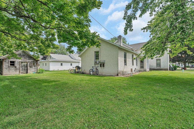 107 N Elm St, Gardner, IL 60424 - view of green lawn featuring an outdoor structure