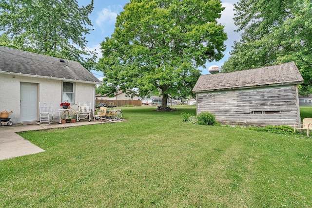 107 N Elm St, Gardner, IL 60424 - view of green lawn featuring a patio area
