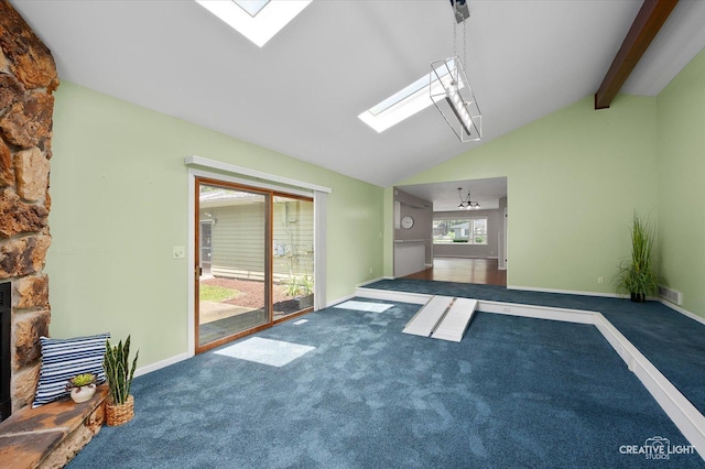 306 Hillside Pl, North Aurora, IL 60542 - unfurnished living room featuring a skylight and carpet flooring