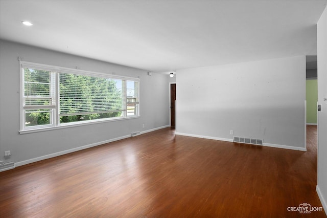 306 Hillside Pl, North Aurora, IL 60542 - spare room with wood finished floors and recessed lighting