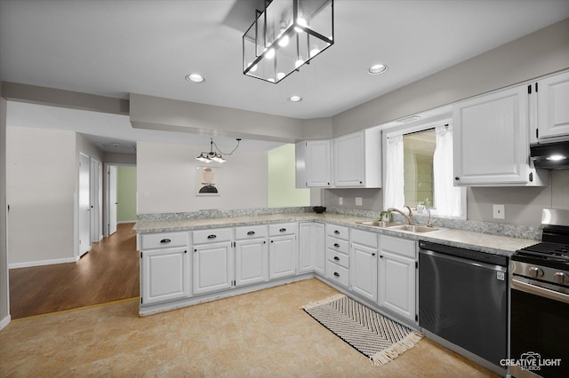 306 Hillside Pl, North Aurora, IL 60542 - kitchen featuring appliances with stainless steel finishes, light countertops, a peninsula, white cabinetry, and recessed lighting