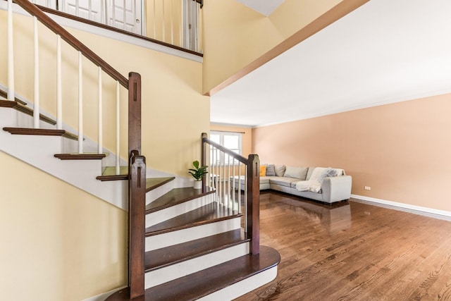2040 Poplar Ave, Hanover Park, IL 60133 - staircase featuring wood finished floors and crown molding