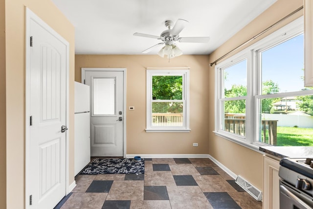 2040 Poplar Ave, Hanover Park, IL 60133 - entryway featuring a ceiling fan and stone finish floors