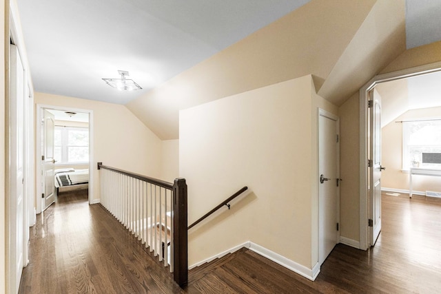 2040 Poplar Ave, Hanover Park, IL 60133 - corridor with an upstairs landing, lofted ceiling, and dark wood finished floors
