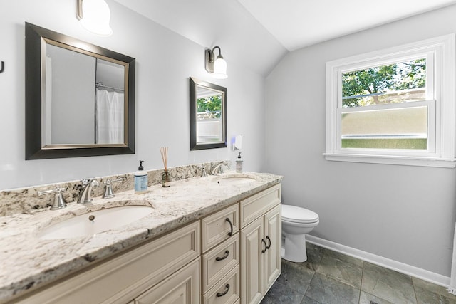 2040 Poplar Ave, Hanover Park, IL 60133 - bathroom with double vanity, plenty of natural light, and lofted ceiling