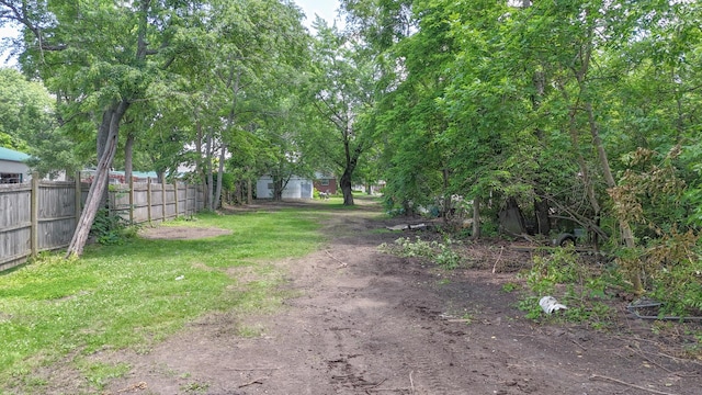 319 N Third St, Fisher, IL 61843 - view of dirt / gravel driveway